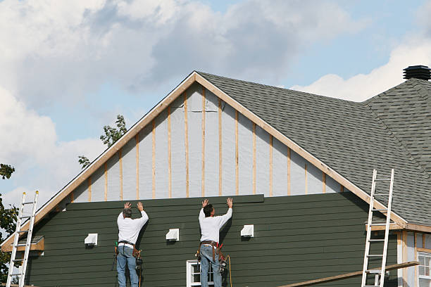 Professional Siding Replacement technician working in Montgomery, TX